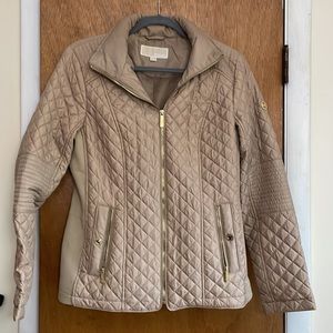 Beautiful gold color Michael Kors fall jacket with gold colored embellishments.